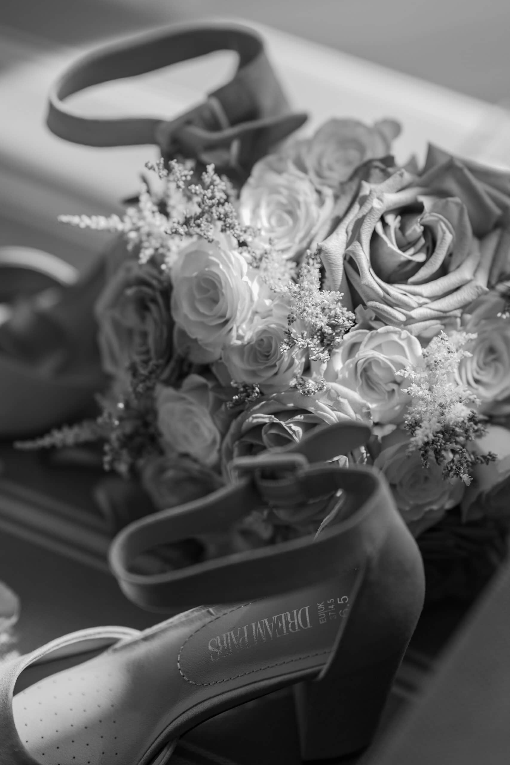 Black and white bouquet with high heels